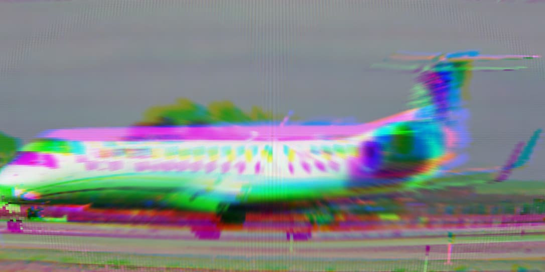 a glitchy edited photo of an airplane
